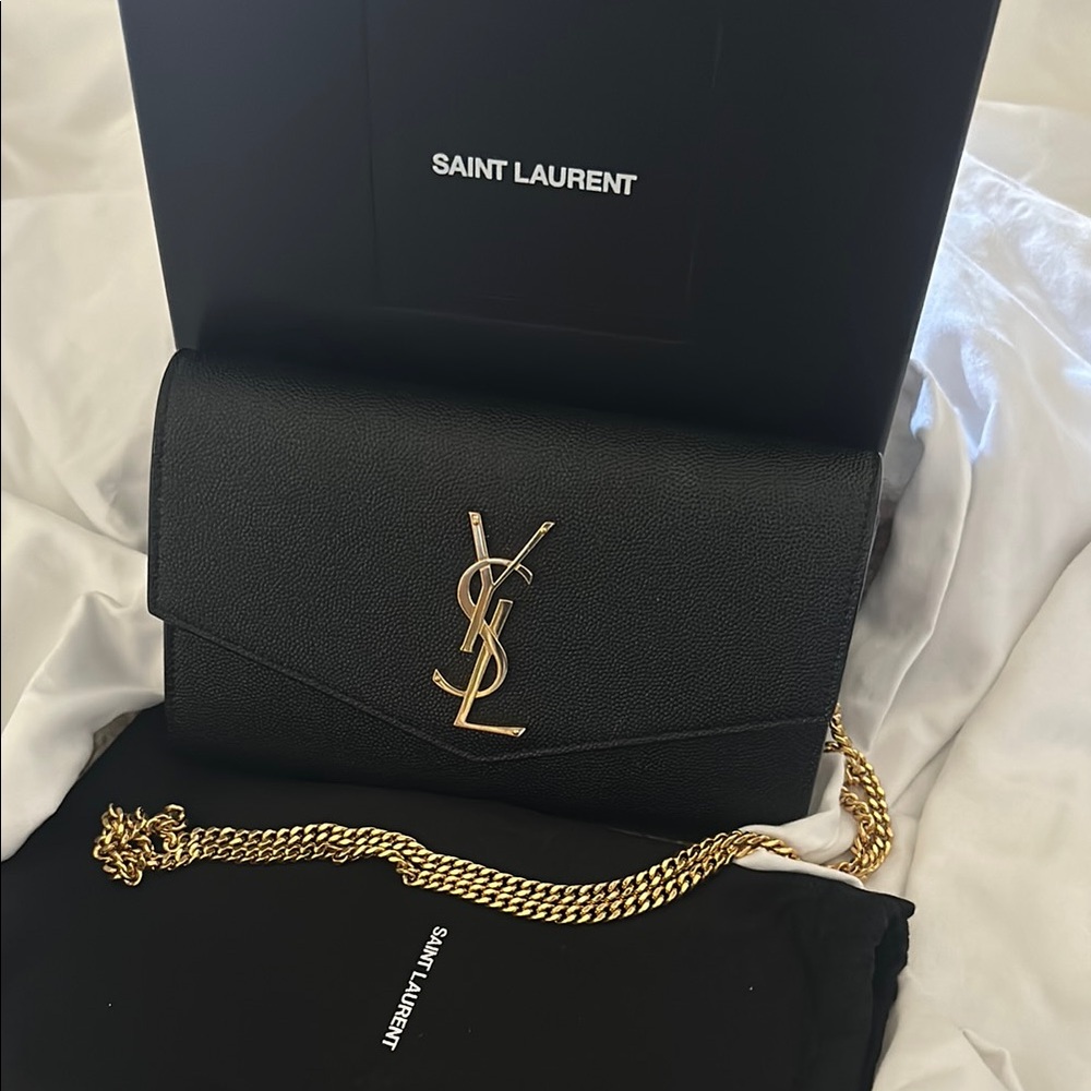 Saint Laurent Black and Gold Clutch
